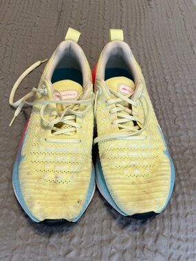 Nike Yellow Knit Running Shoes with Pink and Blue Accents